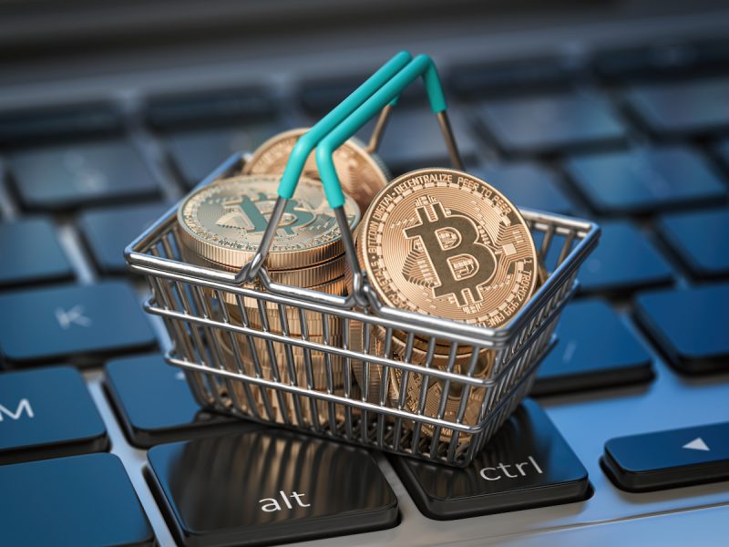 David-W-bitcoin-coins-in-shopping-basket-on-laptop-keyboar-2021-11-02-22-23-55-utc.jpg